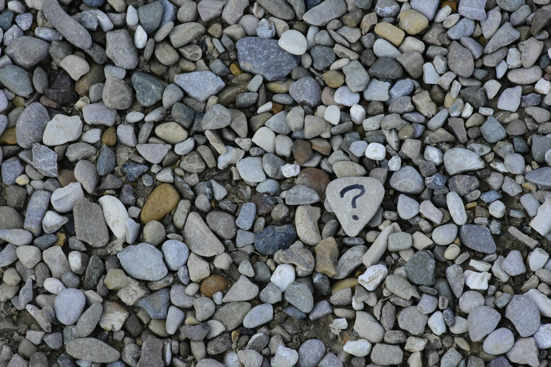 Pile of rocks - one rock has a question mark