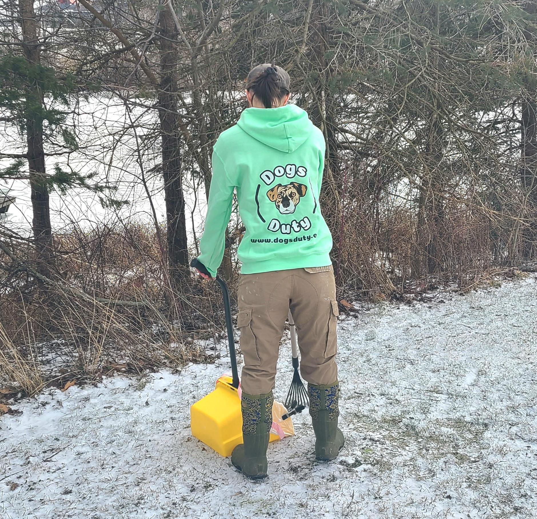 Dogs Duty worker scooping poop